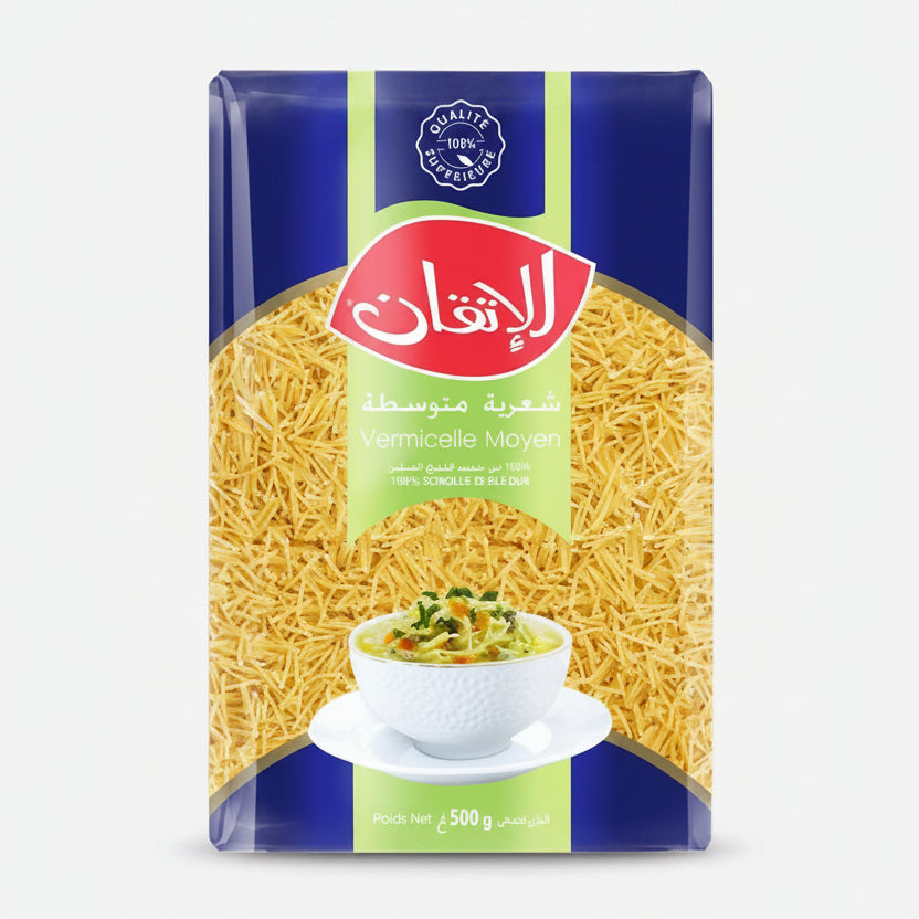 Box of pasta with a bowl of food on a white background