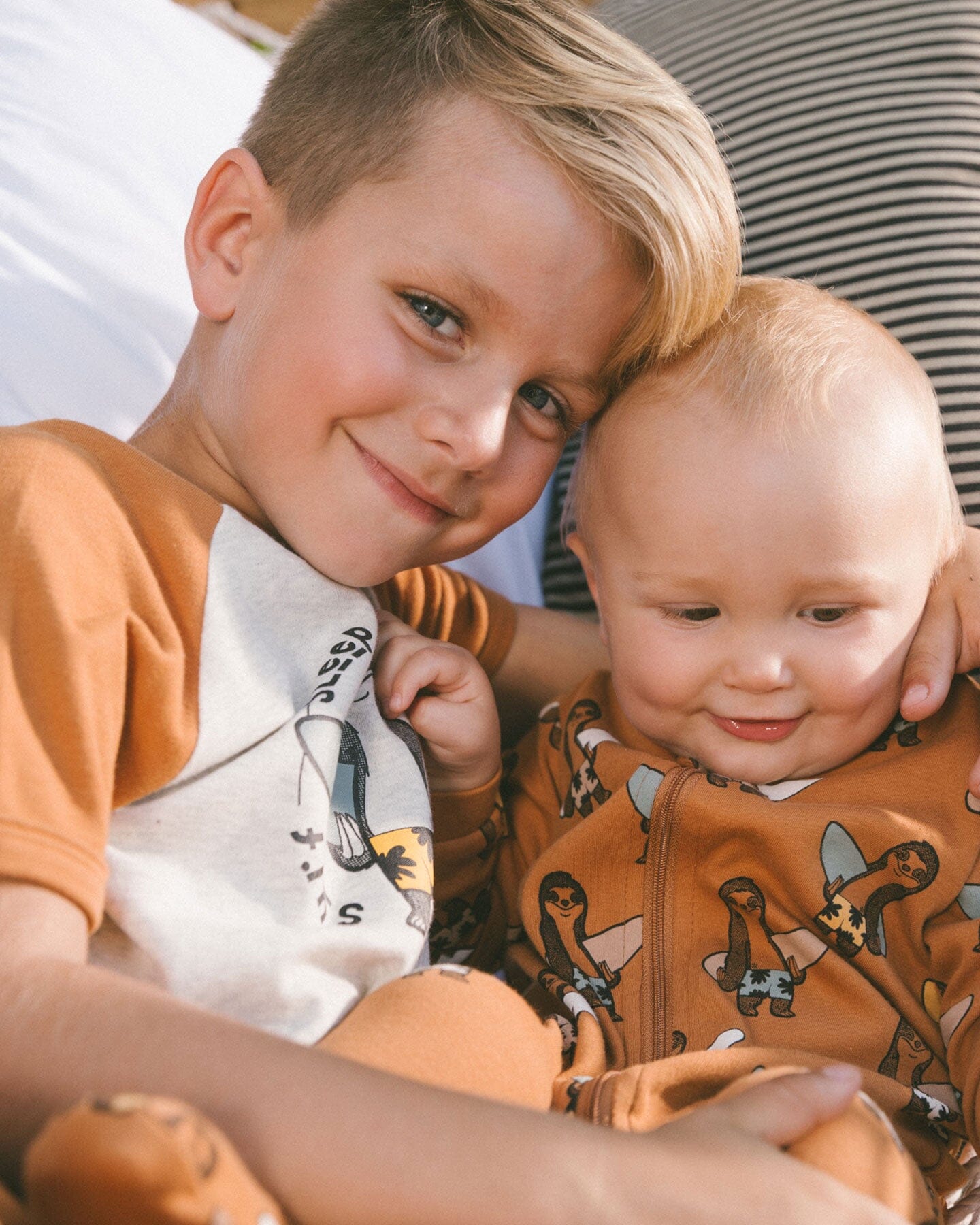 Organic Cotton Two-Piece Short Pajama Set Sloths On Tan And Mottled Background