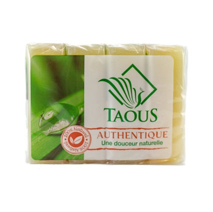 Packaged soap with Taus branding on a white background